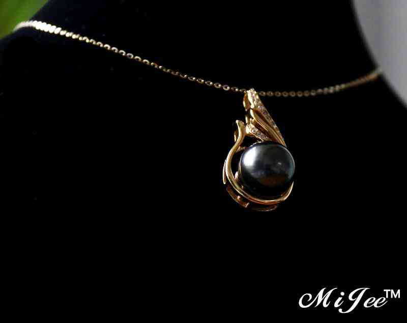 今年最流行的大溪地黑珍珠和14K金的完美结合,很美很耀眼